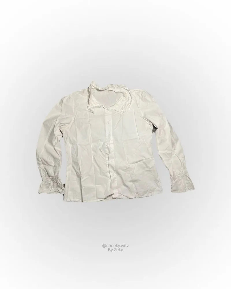 Ruffled collar blouse  photo 1