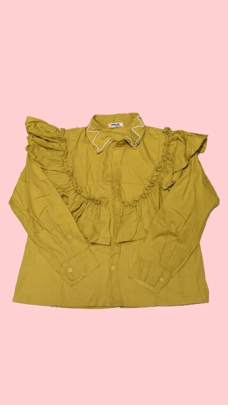 kemeja kuning bagian dada model balon photo 1