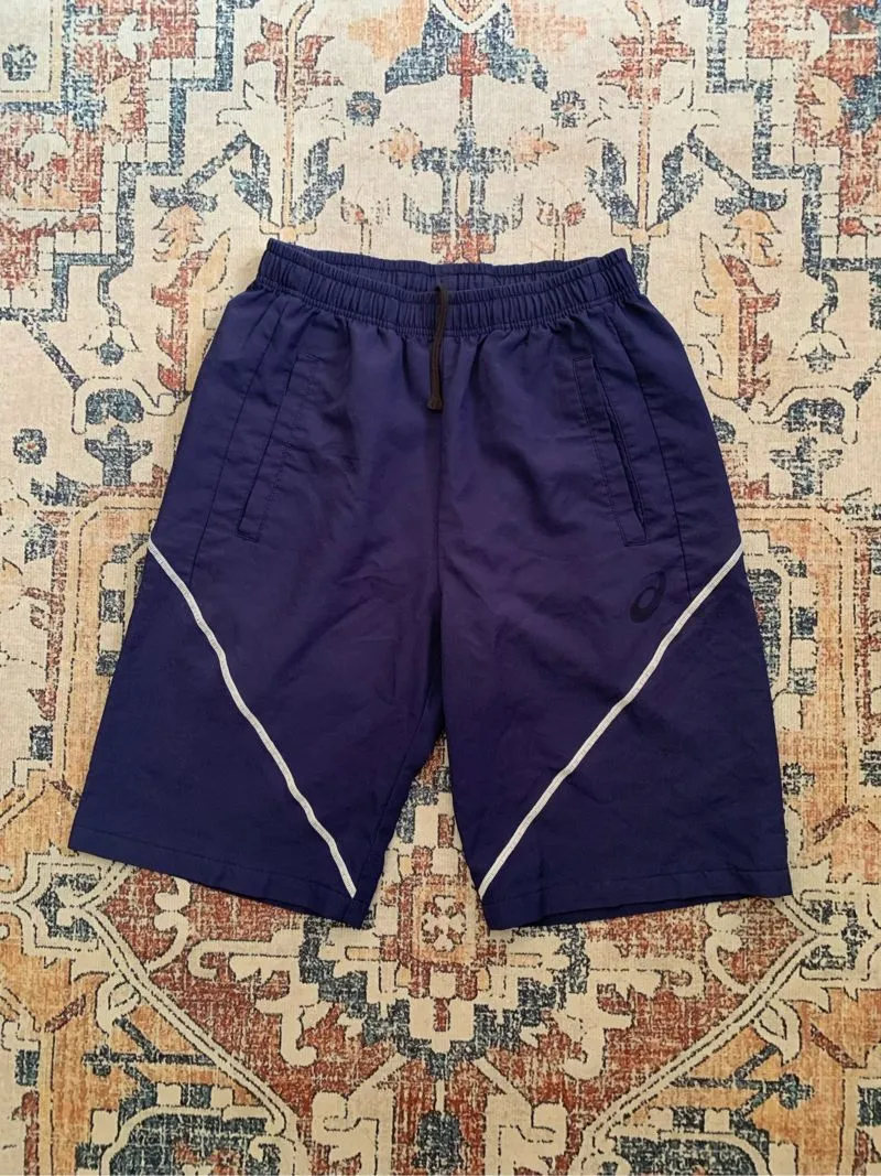 celana pendek asics photo 1