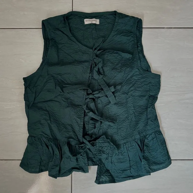 atasan sleeveless pita photo 1