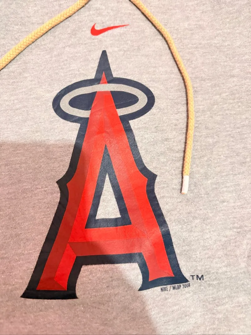 VINTAGE NIKE CENTER LOS ANGELES ANGELS LOGO HOODIE photo 1