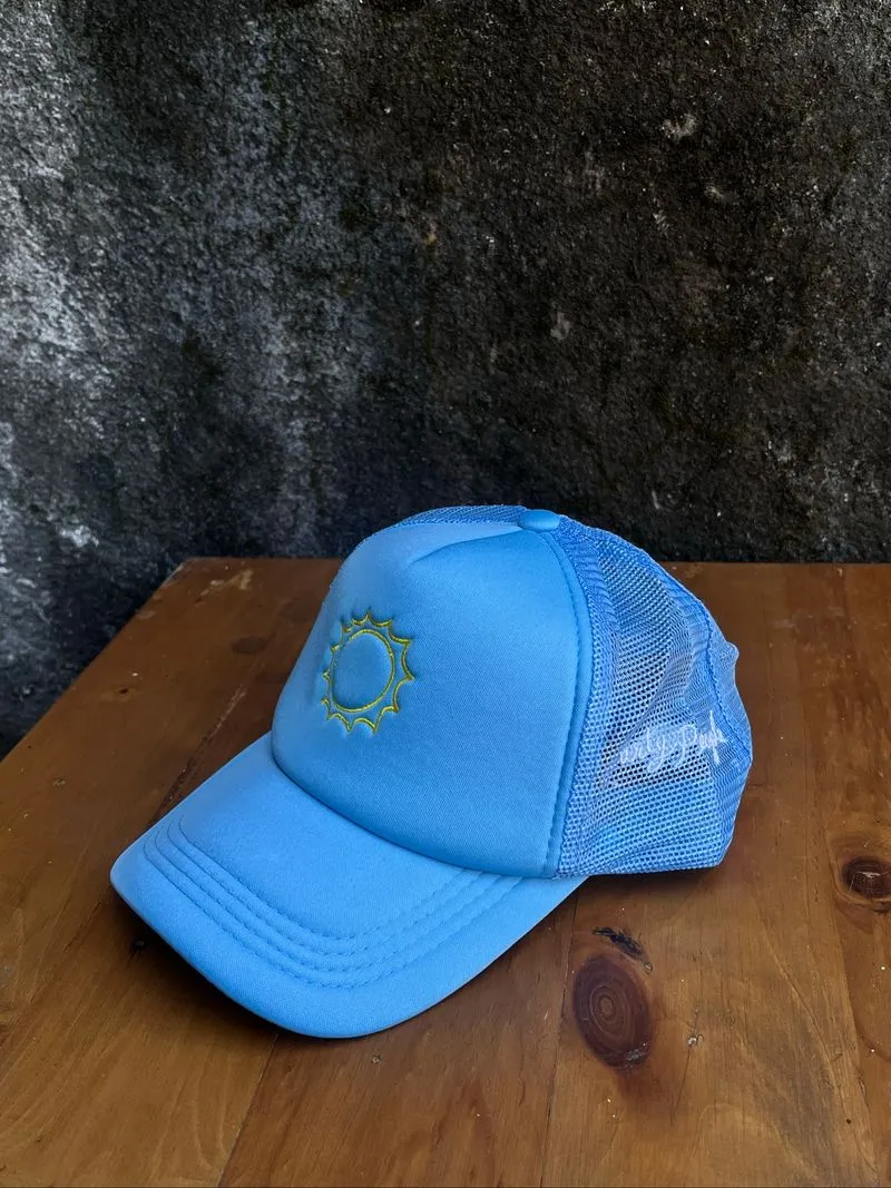 Topi biru logo matahari photo 1