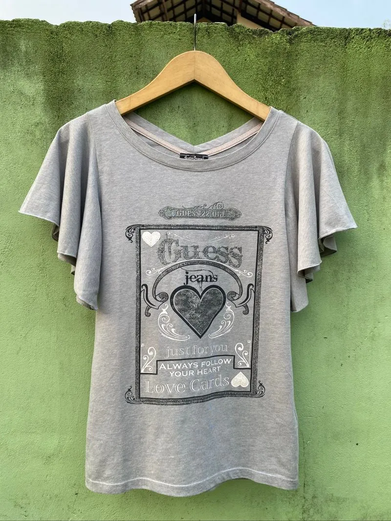 Guess Jeans features a distinctive unique flutter sleeves photo 1