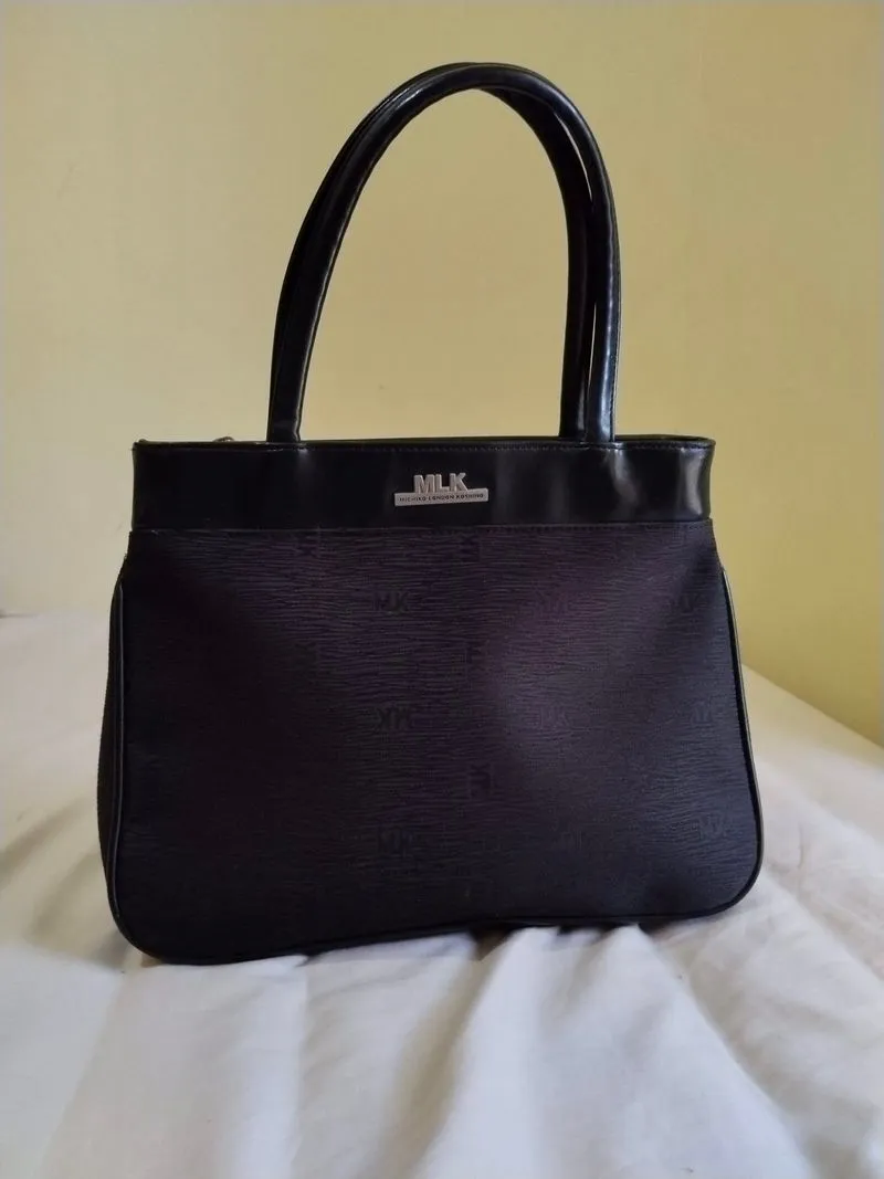 MLK Black textured handbag photo 1