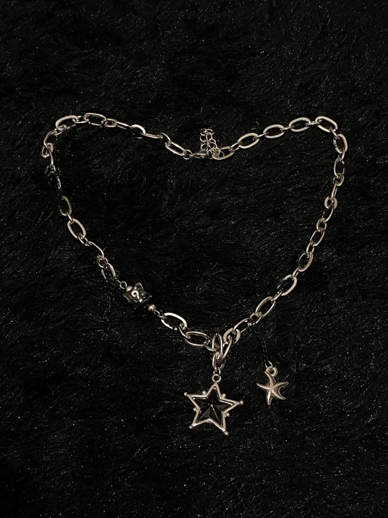 BLACK STAR NECKLACE photo 1