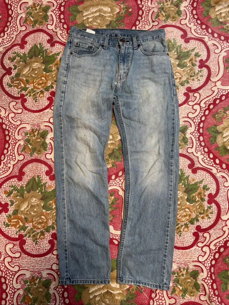 blue denim jeans appear to be a light wash 30x30 photo 1