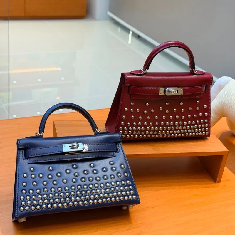 Kelly mini bag studed photo 1