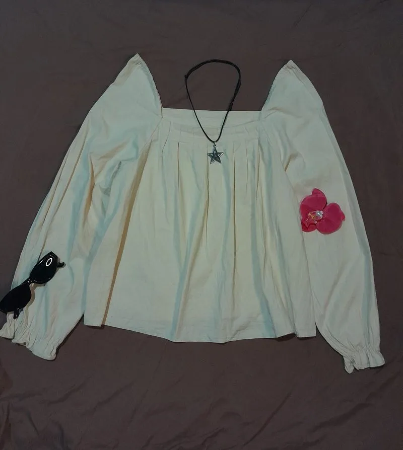 cream blouse photo 1