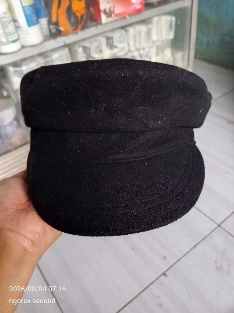 Topi GU photo 1