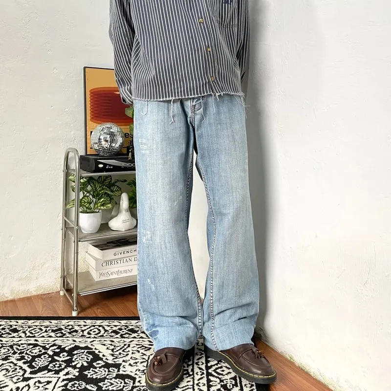 CalvinKlein distressed sun fade blue Loose fit denim photo 1