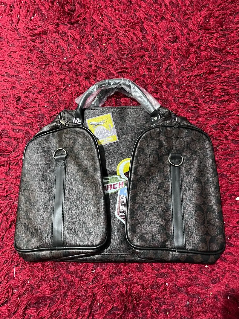 duffle bag crossbody travel bag coach brown print logos photo 1