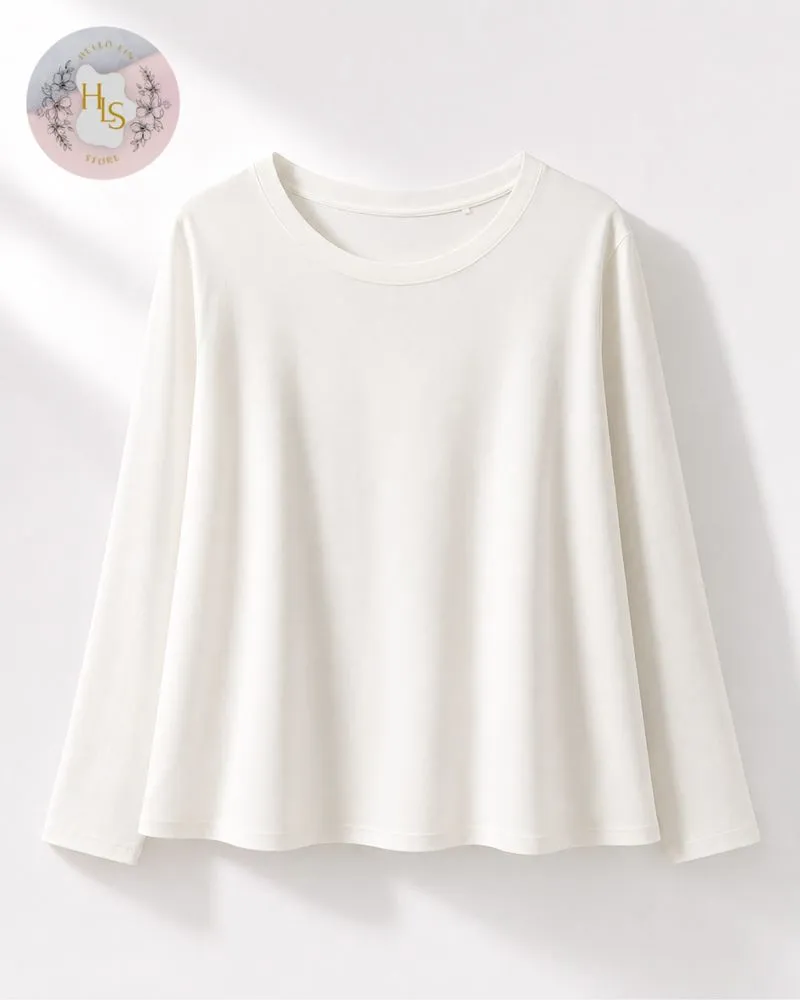 Kaos wanita perempuan warna putih lengan panjang UNIQLO photo 1