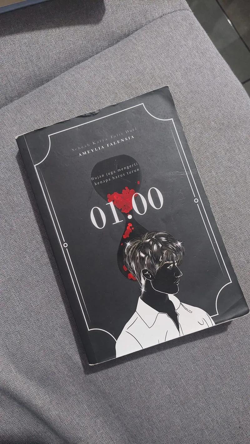 Novel fiksi '01.00' photo 1