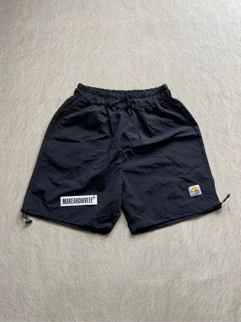 Rugged house short nylon pants photo 1