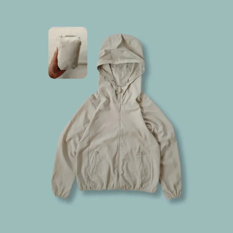 Jaket Parasut Lightweight Uniqlo Pocketable Ivory Second photo 1