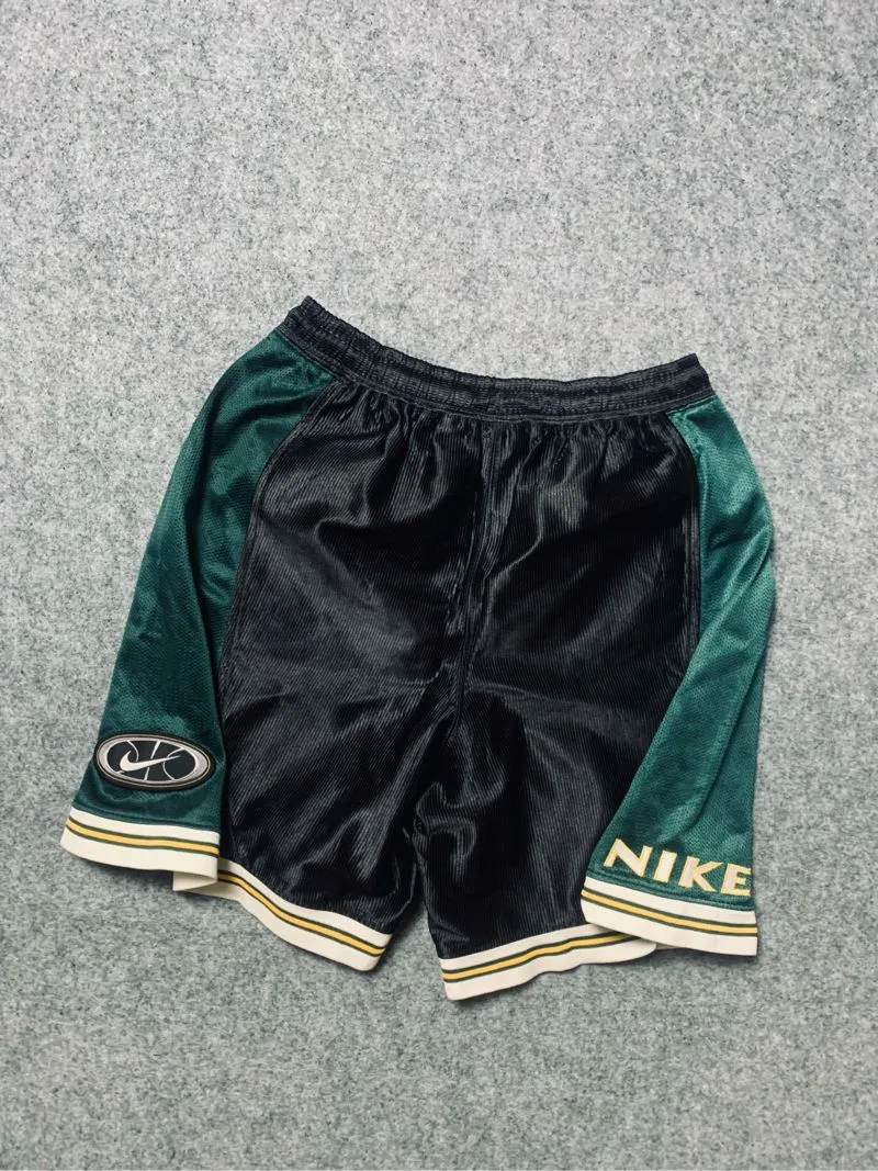 Vintage 90's Nike Black Green Mesh Shorts photo 1