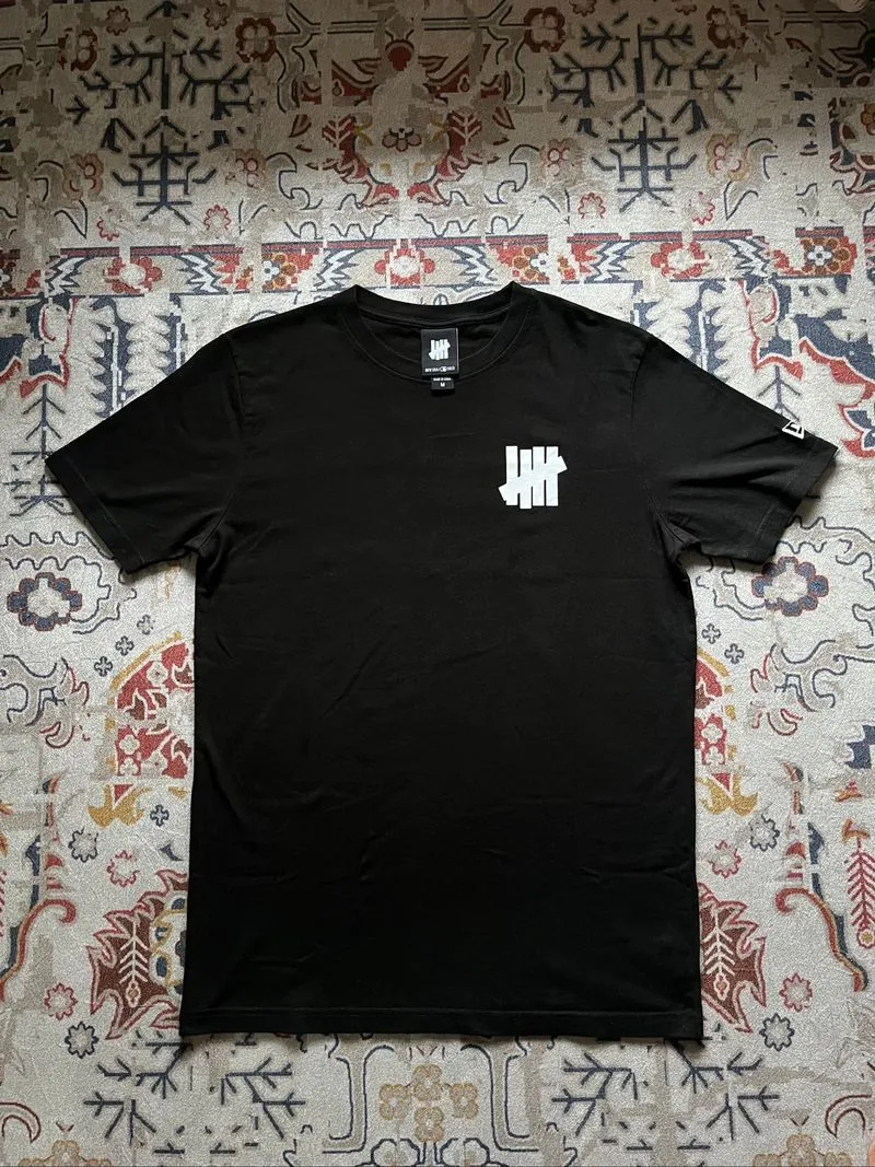 New Era New York Yankees x Undefeated black short-sleeve t-s photo 1
