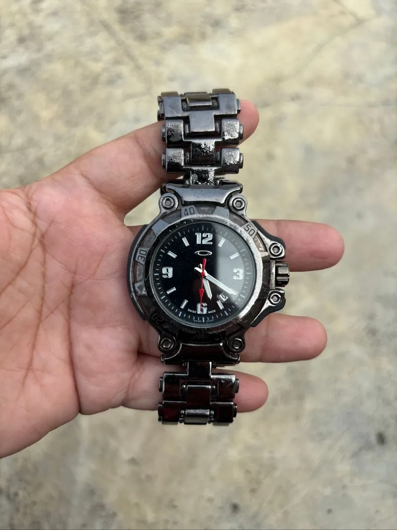 JAM TANGAN OAKLEY CRANKCASE SERIES ANALOG VINTAGE (2) photo 1