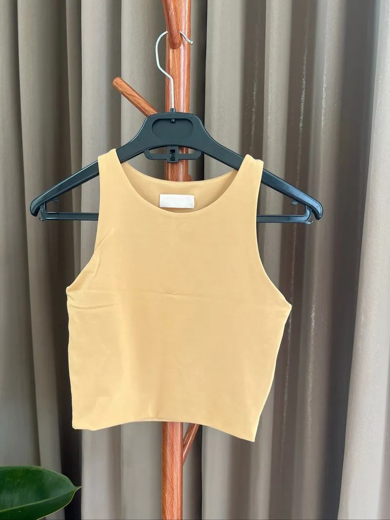 BAREKURVE crop top photo 1