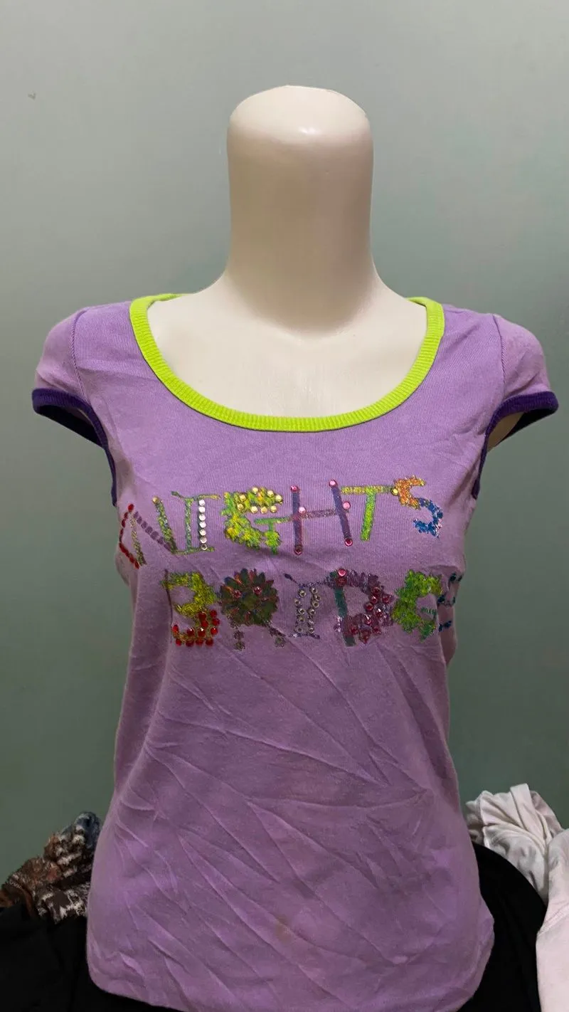 Olivia rodrigo prikitiw purple tipe of top photo 1