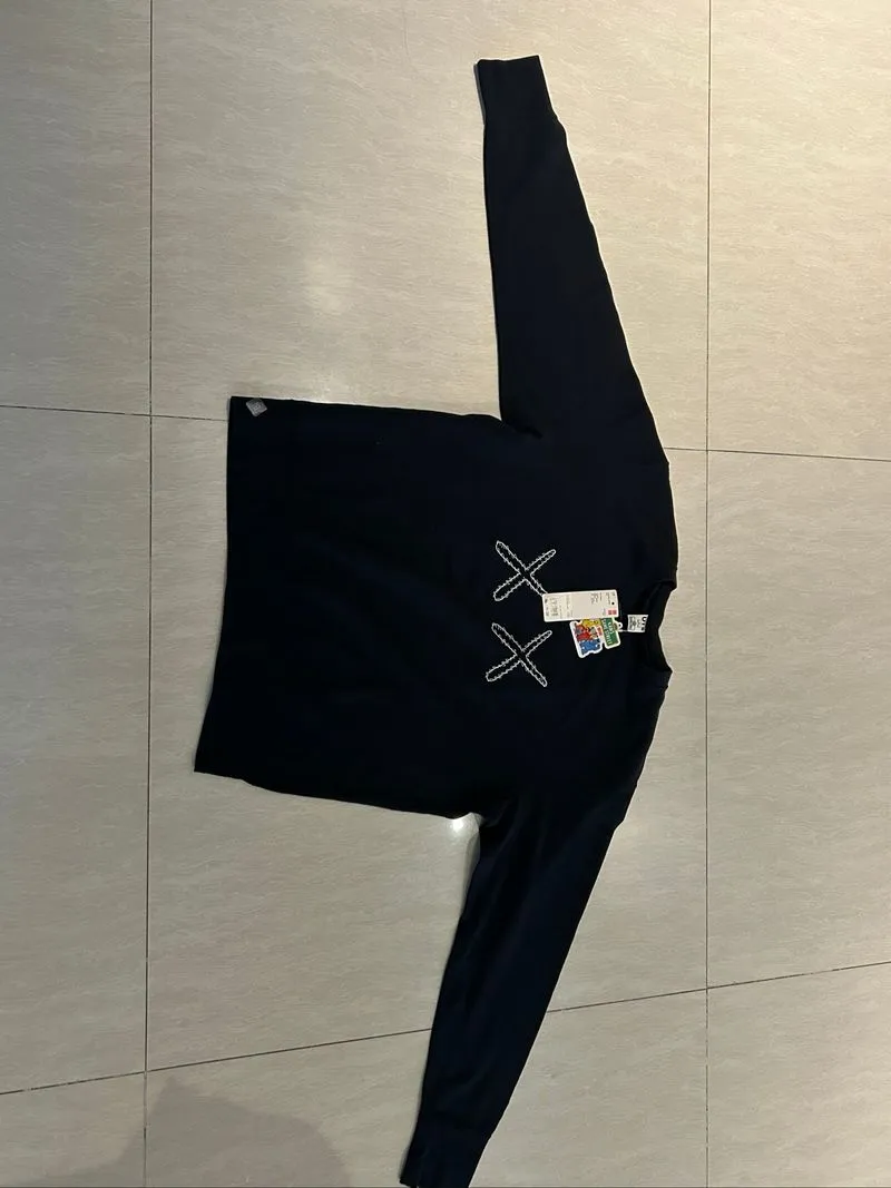 black KAWS x sesame street x Uniqlo crewneck sweatshirt photo 1