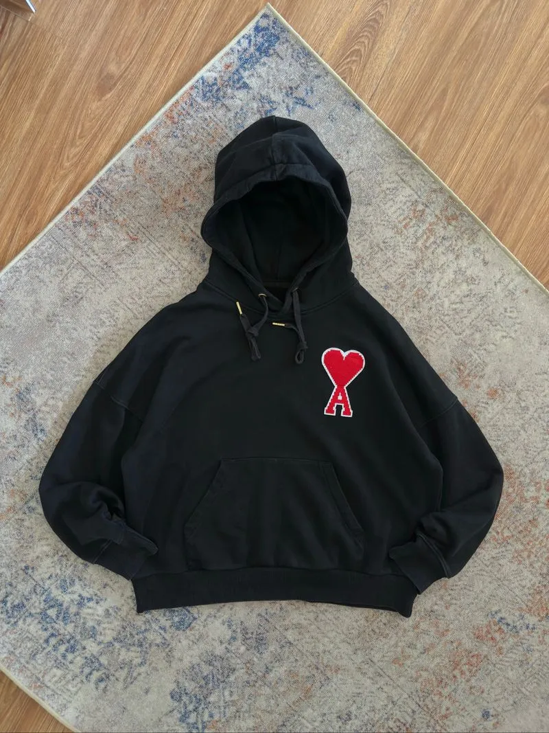 Hoodie Ami Paris warna hitam photo 1