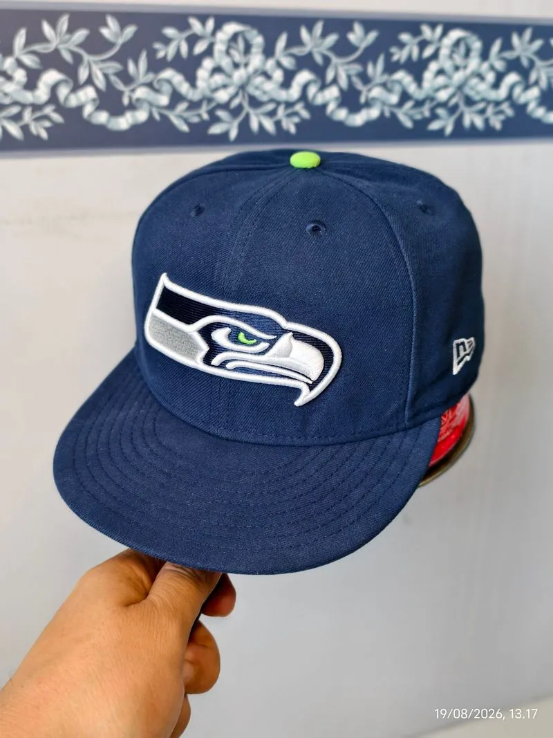 (202) Size 7 3/4 Topi fitted New Era logo Seattle Seahawk photo 1