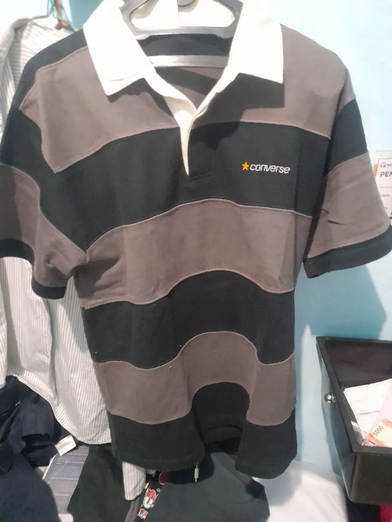 Uniqlo Casual Polo shirt Pria brown black photo 1