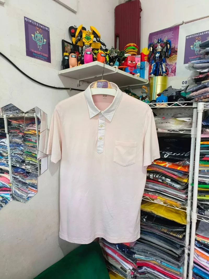 Uniqlo Streetwear Polo shirt Pria cream photo 1