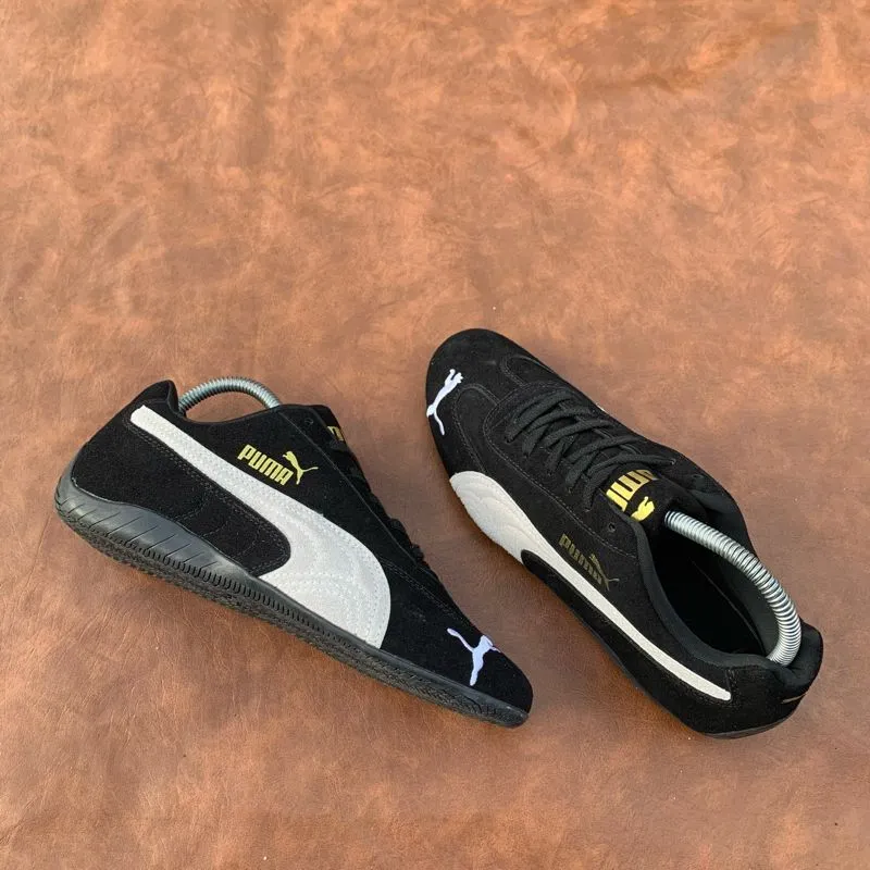 Puma Streetwear Y2K Sneakers Pria white black photo 1