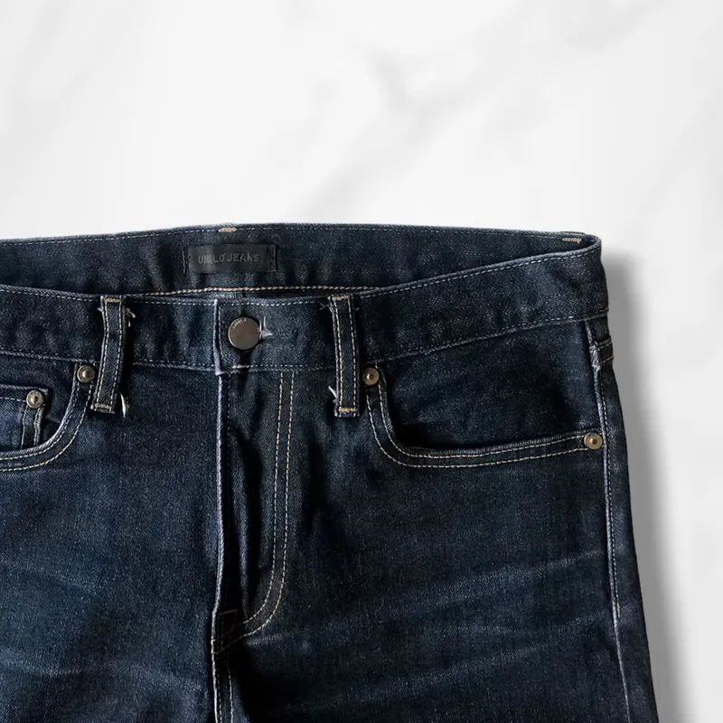 Uniqlo Minimalist Casual Jeans Pria navy photo 1