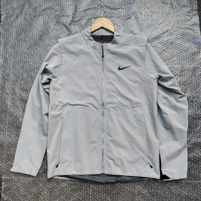 Nike Sportswear Windbreaker Pria gray photo 1