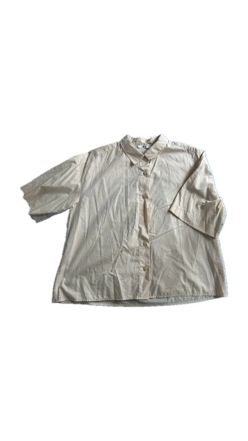 Uniqlo Minimalist Casual Blouse Wanita orange cream photo 1