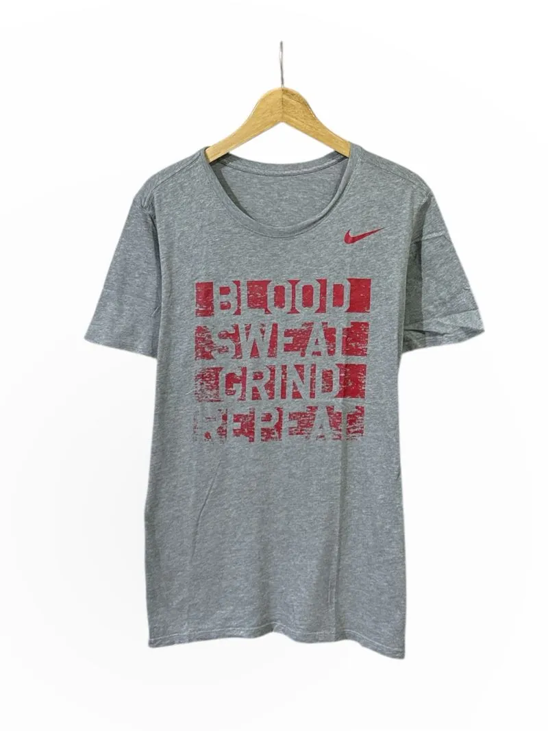 Nike Y2K Sportswear T-shirt Pria gray photo 1