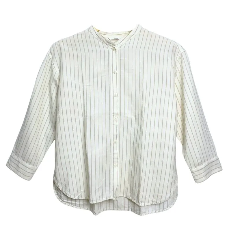 Uniqlo Minimalist Casual Shirt Wanita cream photo 1