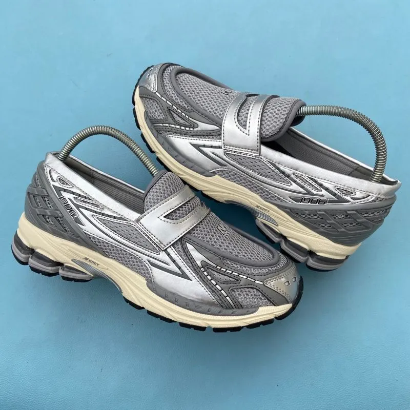New Balance Casual Sneakers Pria gray photo 1