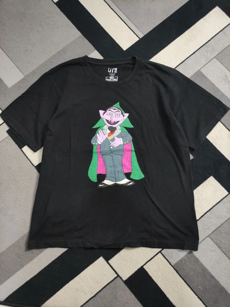 Uniqlo Minimalist T-shirt Pria black photo 1