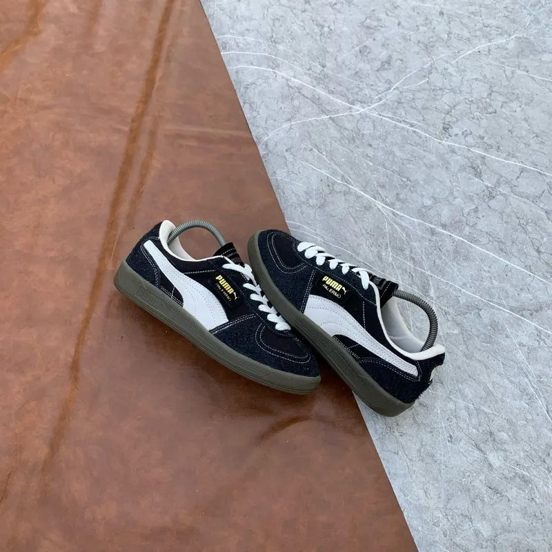 Puma Streetwear Sportswear Sneakers Pria white black photo 1