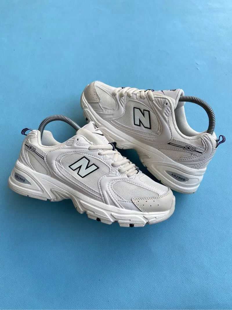 New Balance Casual Sneakers Wanita tan cream photo 1