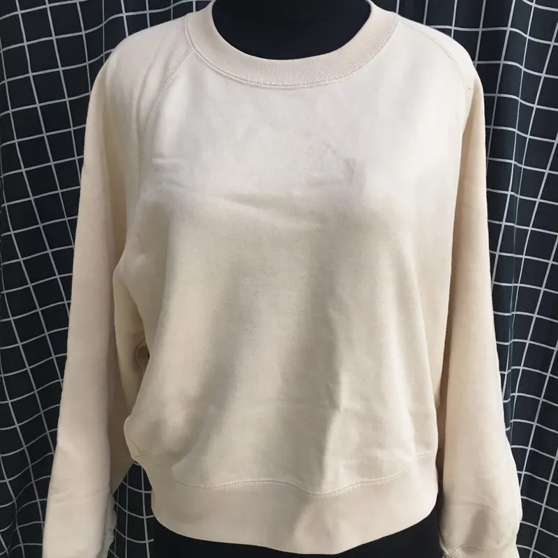 Uniqlo Casual Sweater Wanita cream photo 1