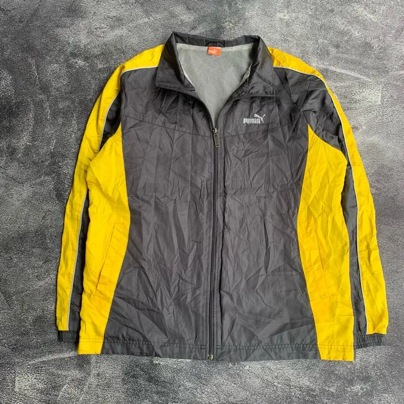 Puma Sportswear Windbreaker Pria yellow photo 1