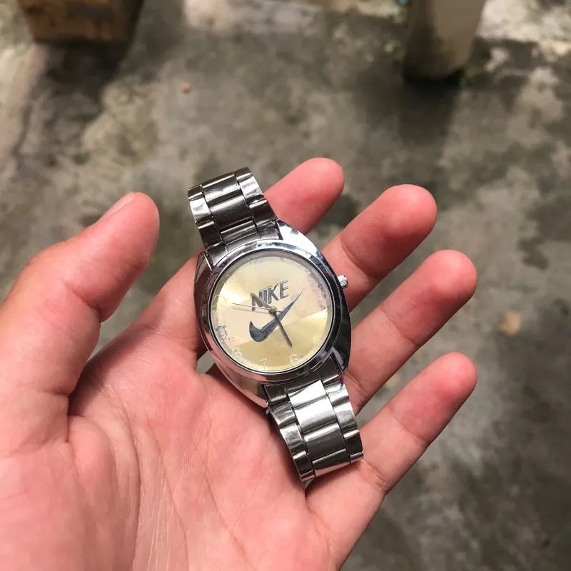 Nike Batik Pria tan gray photo 1