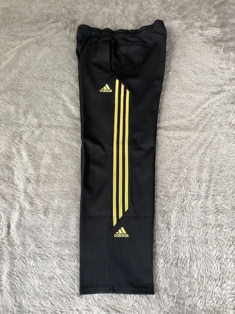 Adidas Streetwear Sportswear Pria gold black photo 1