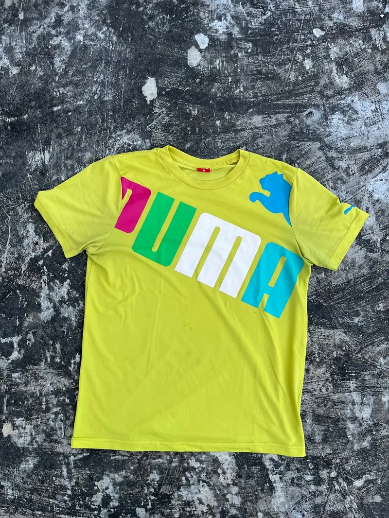 Puma Sportswear T-shirt Pria yellow photo 1
