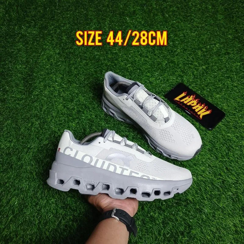 On Running Sportswear Sneakers Pria gray photo 1
