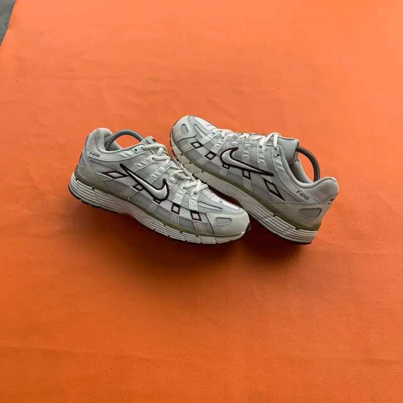 Nike Streetwear Sportswear Sneakers Pria silver brown photo 1