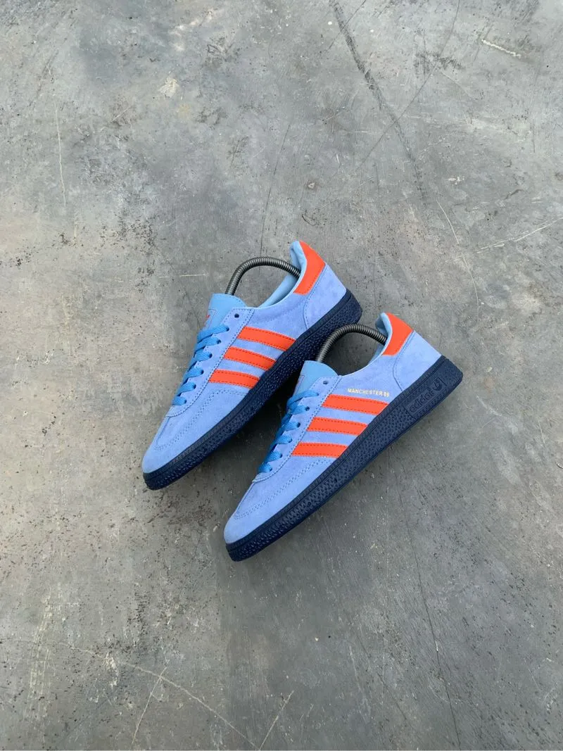 Adidas Streetwear Casual Sneakers Pria orange blue photo 1