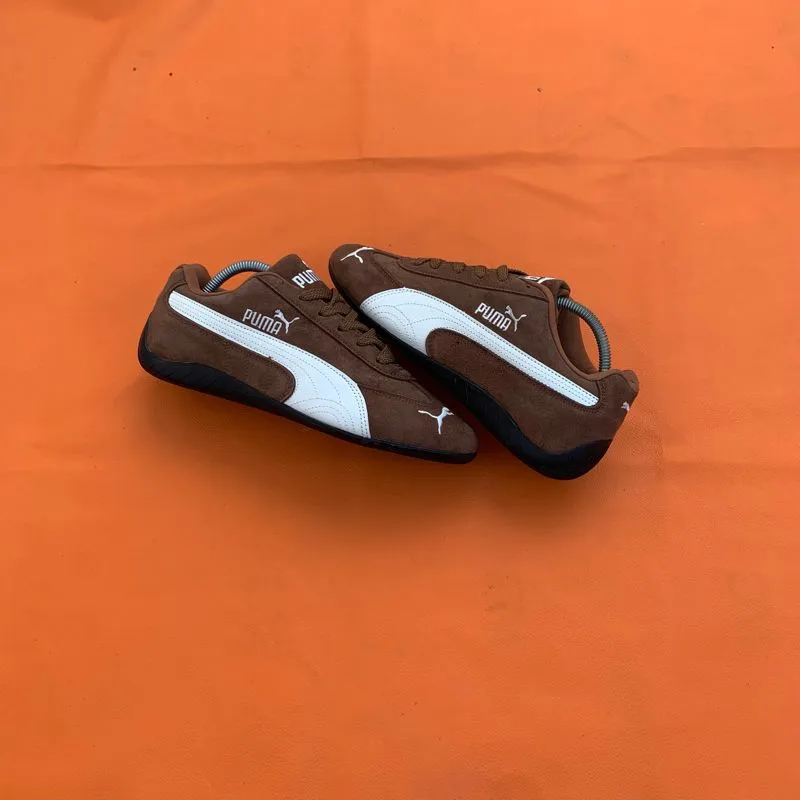 Puma Streetwear Sportswear Sneakers Pria white brown photo 1