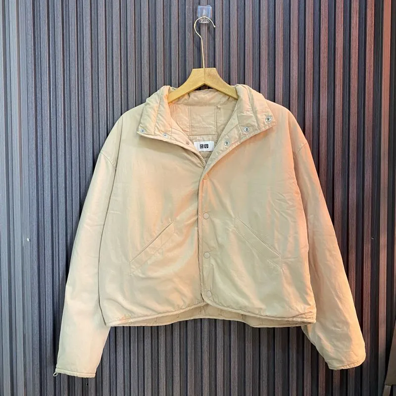 Uniqlo Streetwear Casual Puffer jacket Pria cream photo 1