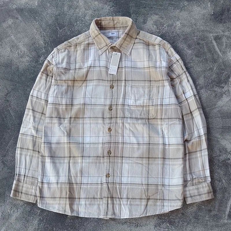 Uniqlo Casual Casual shirt Pria cream tan photo 1